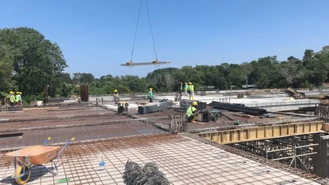 Fast Installation of Precast Hollow Core Slabs on Construction Site Stock Footage 332835235