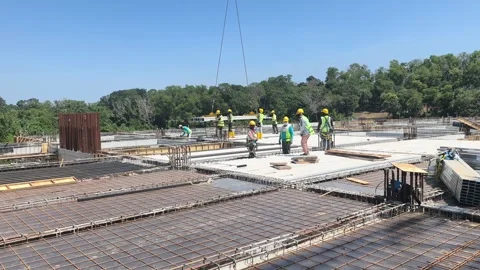 Fast Installation of Precast Hollow Core Slabs on Construction Site Stock Footage 332835264