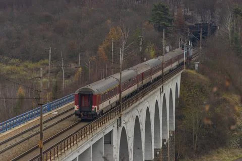Fast international train on bridge Miru near Tisnov station in Moravia in aut Stock Photos