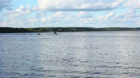 Fast jet ski on lake in summer day Stock Footage