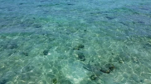 Fast Low Drone Flight From Beach to Turquoise Water Bamboo Island Stock Footage 331145036