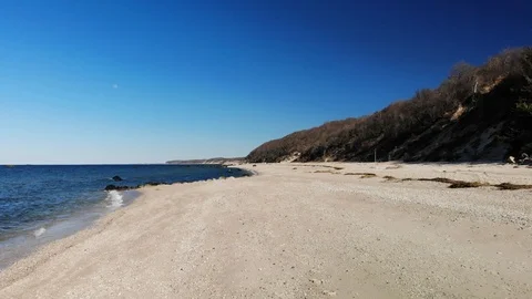 Fast Low Flying Drone over Beach, then Rising Stock Footage 109294580