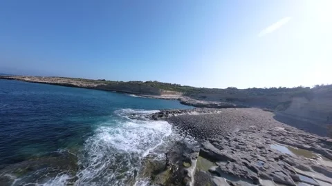 Fast maneuverable fpv drone flight over the sea coast Stock Footage 248651596
