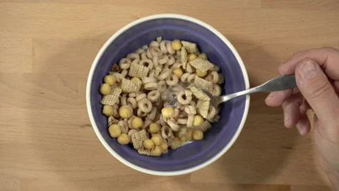 Fast motion close up of a man eating cereal for breakfast Stock Footage 208685921