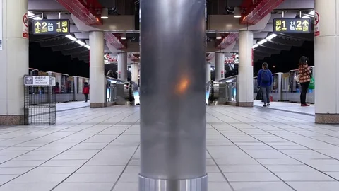 Fast motion of commuters getting in and out of the skytrain at platform Stock Footage 83105799