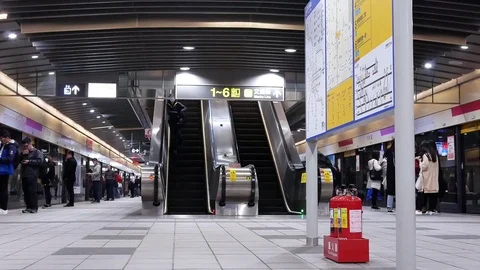 Fast motion of commuters getting in and out of the MRT at platform Stock Footage 83797946