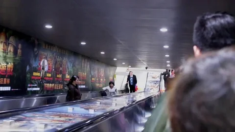 Fast motion of commuters taking escalator for going to MRT platform Stock Footage 83928267