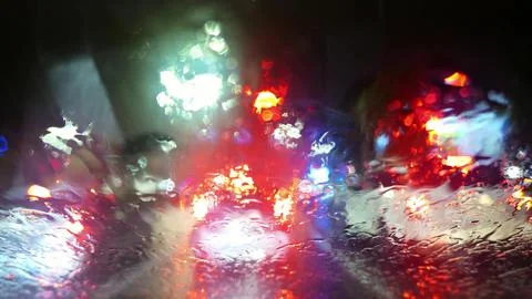 Fast Motion Dash Cam Night City Lights In Rain POV Stock Photos