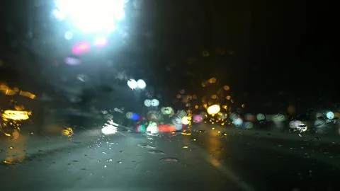 Fast Motion Dash Cam Night City Lights In Rain POV Stock Photos