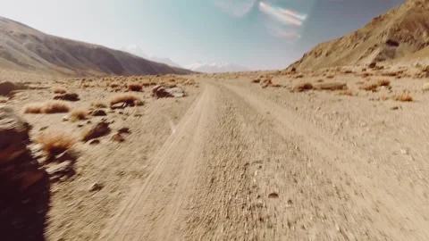Fast motion hyper lapse biking curvy turning gravel bumpy road section with.. Video stock 280264754