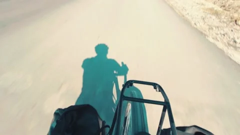 Fast motion hyper lapse wheel view with man silhouette cycling on bicycle on  Stock Footage 162952157