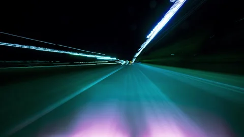 Fast motion hyperlapse driving through a roadl with streaking lights and strong Video stock 346890259