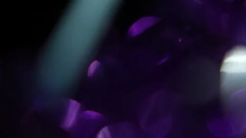 Fast motion light leak video of focused purple bokeh wabi Stock Footage 315315245