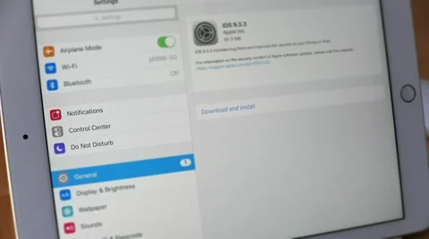 Fast motion of man updating and downloading ipad new ios Stock Footage 65502656