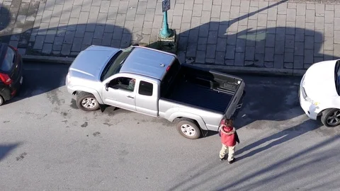 Fast motion of parallel parking on the road for a long time Stock Footage 72972833