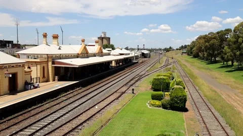 Fast motion passenger train arrival at Wagga Wagga station platform as 4k. Stock Footage 168107073