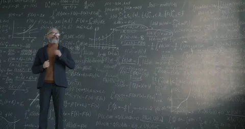 Fast motion of pensive scientist walking near chalkboard wall thinking about Video stock 280654720