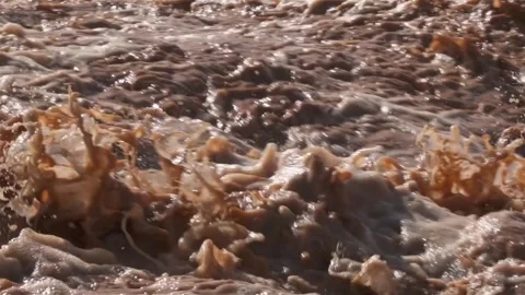 Fast motion river with muddy water splashing after heavy rain storm background Stock Footage 235030133