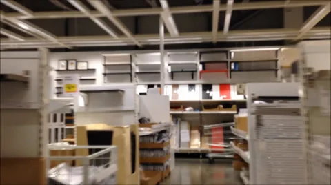 Fast motion of side view of corridor inside ikea Stock Footage 39488140