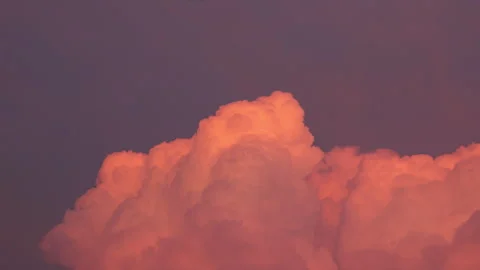 Fast motion timelapse of cloud shape change in the warm light of sunset Stock Footage 300275781