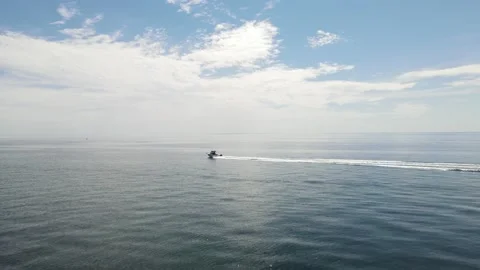 Fast motor boat sailing through the bay drone aerial	 動画素材 196674181