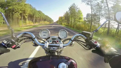 Fast motorcycle riding on the beautiful empty road. Video stock 104312512