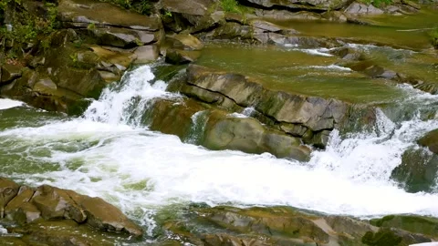 Fast Mountain River Flowing Over Rocks During Rain Stock Footage 347907272