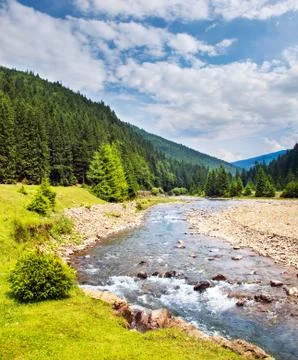 Fast mountain river. Stock Photos