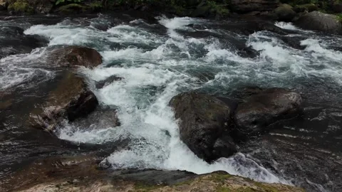 Fast Mountain River Rapids Flowing Between Rocks. Powerful Water Stream. Stock Footage 335681273