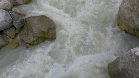 Fast mountain river, slow movement, close-up. Video stock 94425043