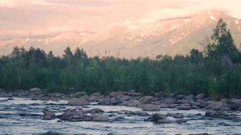 Fast Mountain River Stream Flowing Over Rock Boulders with Blurred Background Stock Footage 114645242