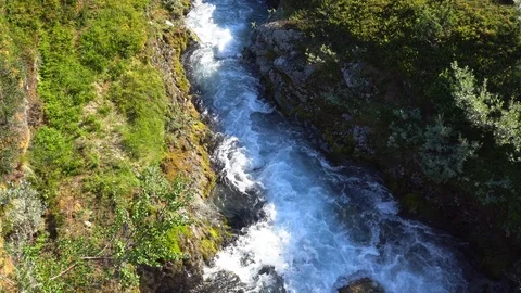 Fast mountain river stream in Norwegian Highlands Stock Footage 95673237