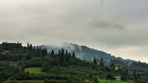 Fast Movement of the clouds over the mountains 動画素材 73924492