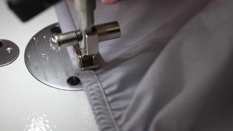Fast movement of the sewing machine needle on the fabric. Stock Footage 178405088