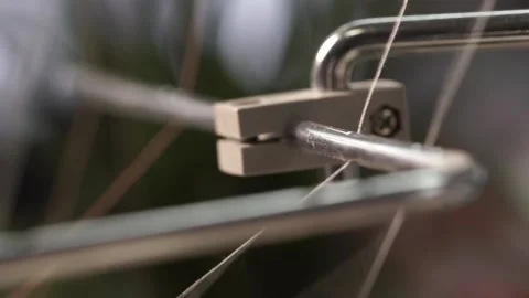 Fast movement of the sewing machine needle on the fabric. The needle of the Stock Footage 193976447