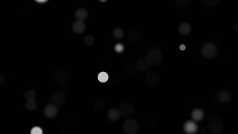 Fast movement of unfocused grey balls on a black background HD 1080 Stock Footage 126507577