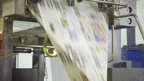 Fast moving of automatic line with paper on machine in printing house Stock Footage 71315886
