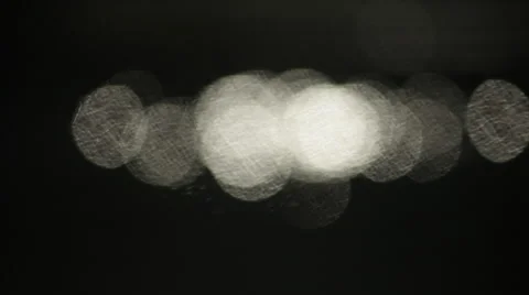 Fast moving big shining sparkles in the middle of dark water background. B 库存影片 47221437