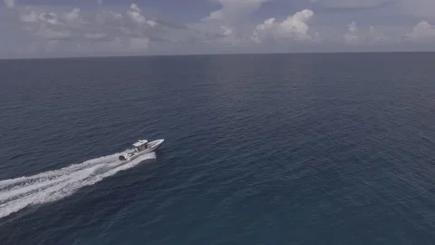 Fast Moving Boat Tracking Wide Stock Footage 145236495