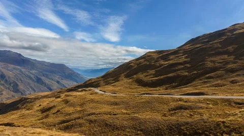 Fast Moving Cloud Over Mountain Valley, Motion Time Lapse Pan Left Video stock 63885720