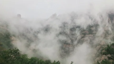 Fast moving cloud in rainy day in mountains Stock Footage 122158846