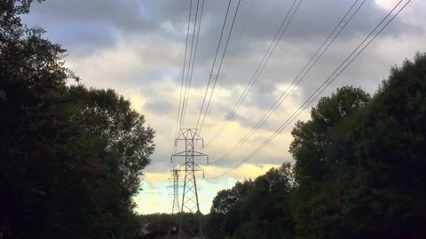 Fast moving clouds above power lines before a hurricane Stock Footage 95006057