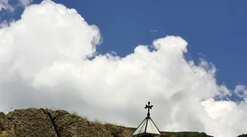 Fast Moving Clouds Above a Religous Cross Stock Footage 53232562