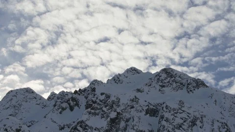 Fast moving clouds above summit Stock Footage 102170942