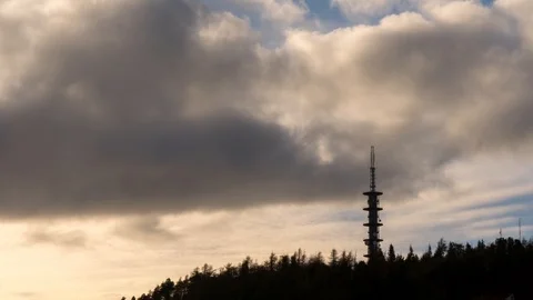 Fast moving clouds with antenna in the foreground. Stock Footage 89943483
