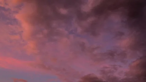 Fast-moving clouds are changing colors. Stock Footage 149911721