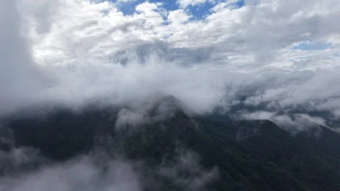 Fast Moving Clouds Ascending Drone Shot, South Korea Stock Footage 345946500