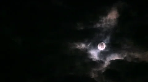 Fast moving clouds on a background of the moon Stock Footage 55367406