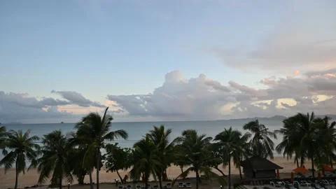 Fast moving clouds at the beach Stock Footage 194386169
