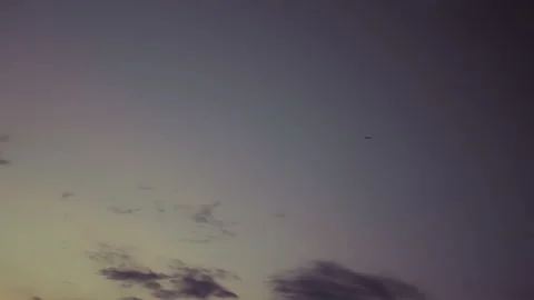 Fast moving clouds in the evening sky. Timelapse Stock Footage 155862666